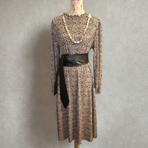 Kleid beige,schwarz gemustert Gr.42/44